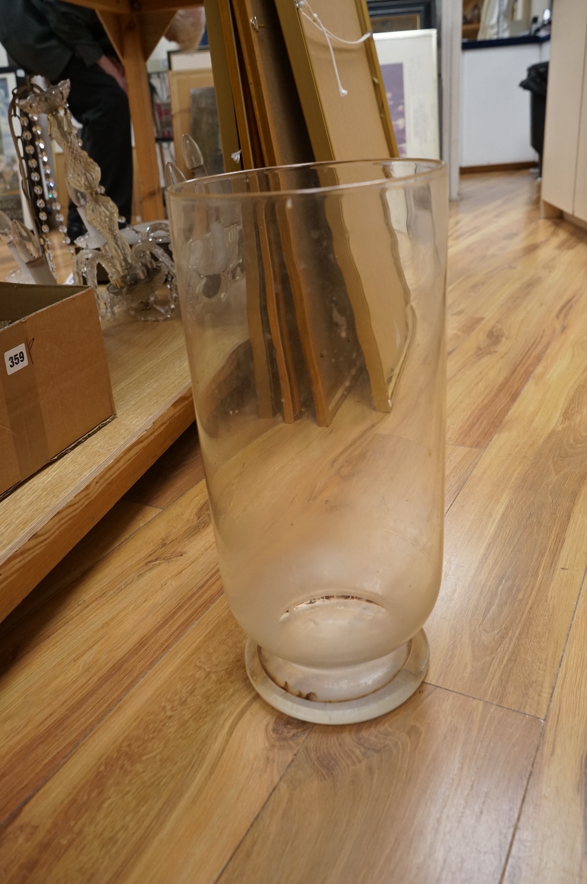Three large glass vases, tallest 60.5cm